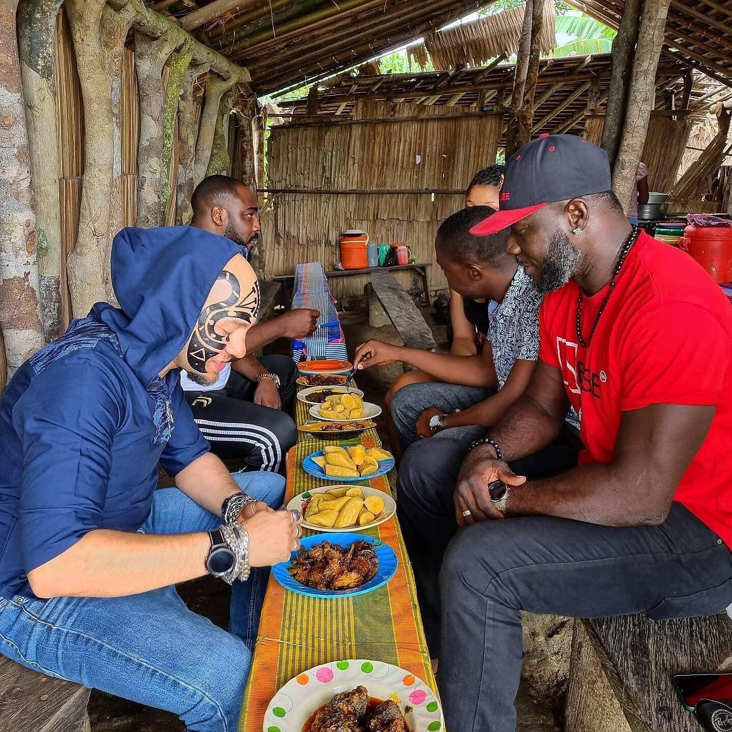 People eating bushmeat at the Atimbo Bushmeat Joint in Calabar.