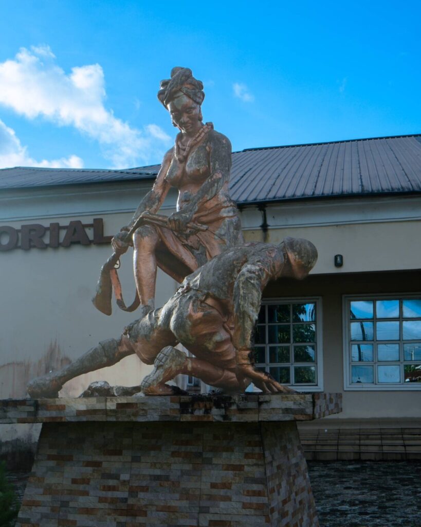 A monument of an indigenous woman overpowering a British soldier and taking his gun in Ikot Abasi, Akwa Ibom State, at the 1929 Women's War Memorial.