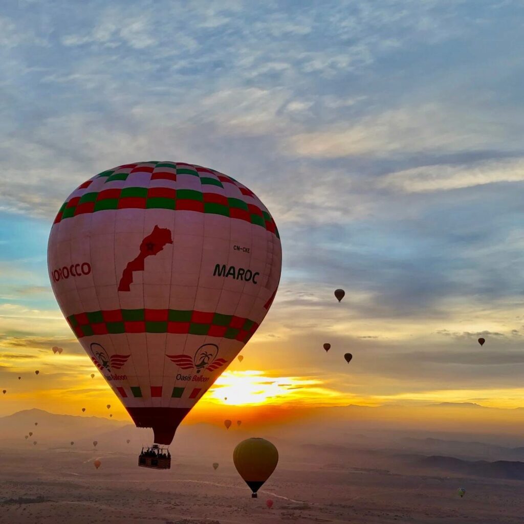 Hot-air balloon ride during sunrise across the Sahara