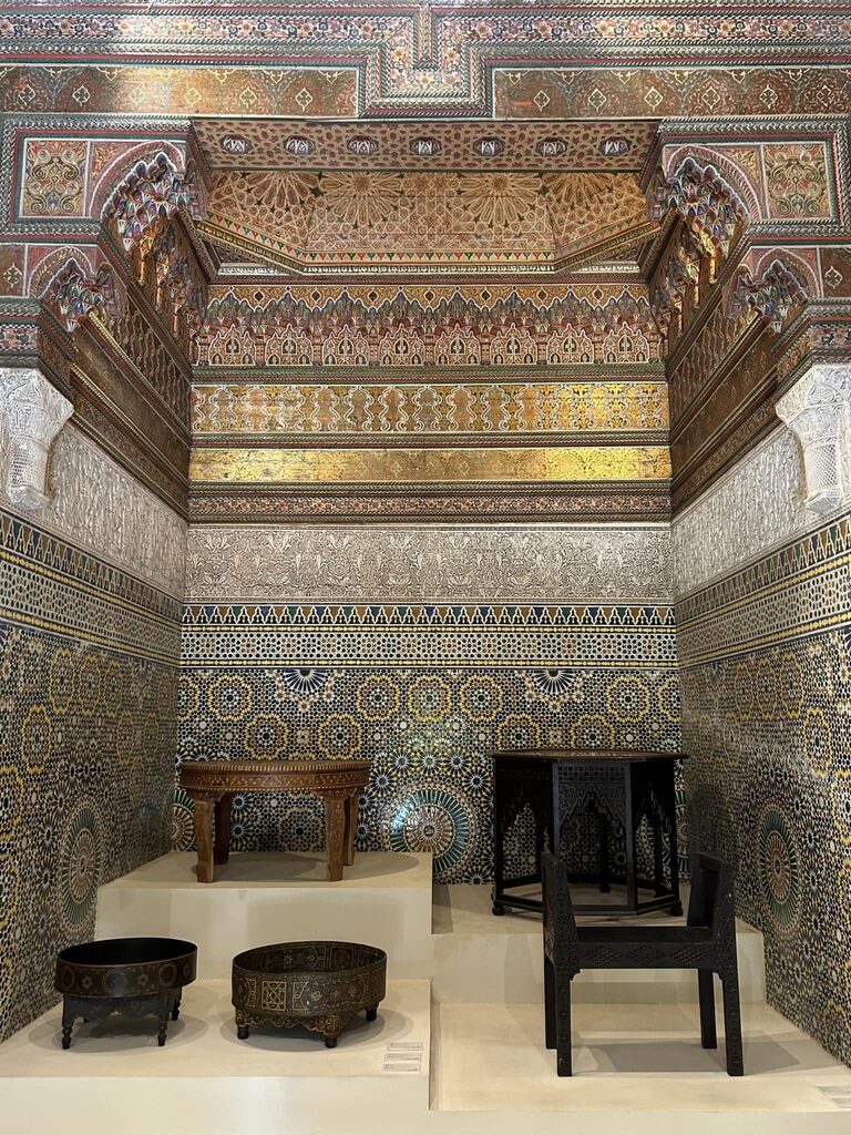 Intricate designs and a collection of antiques inside a room in the Dar El Bacha Museum (Museum of Confluences)