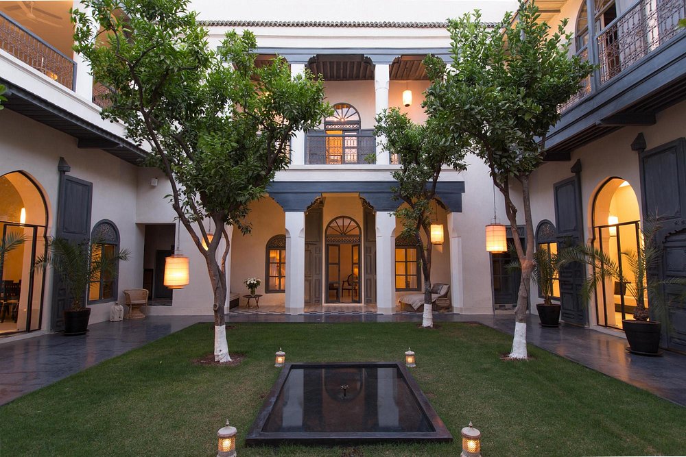 The central courtyard and balcony of Riad Tarabel in Marrakech